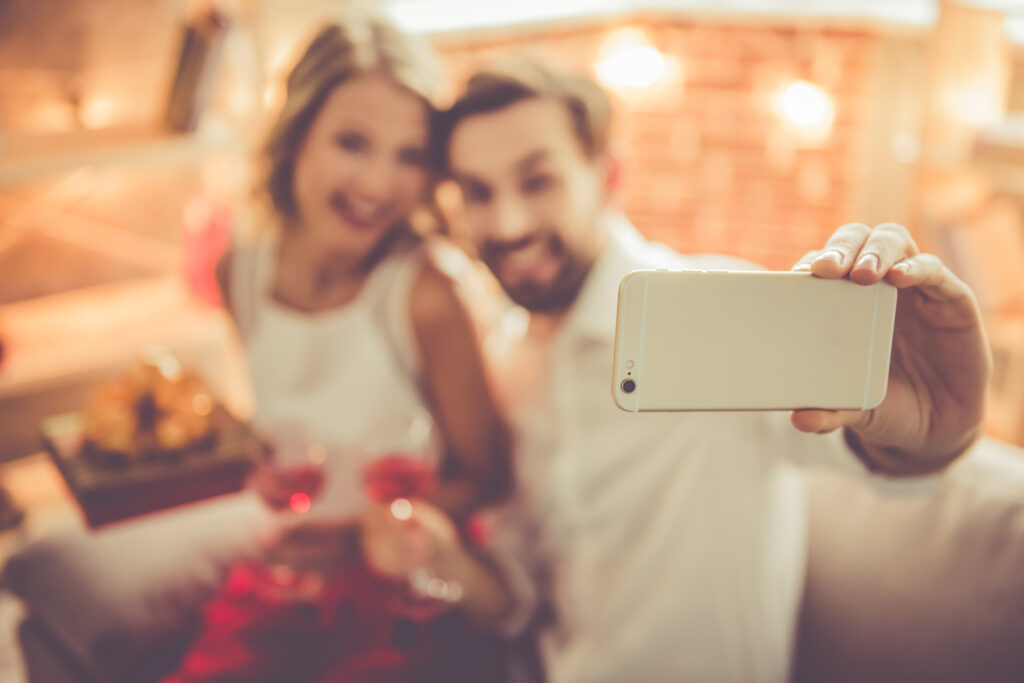 beautiful couple taking selfie
