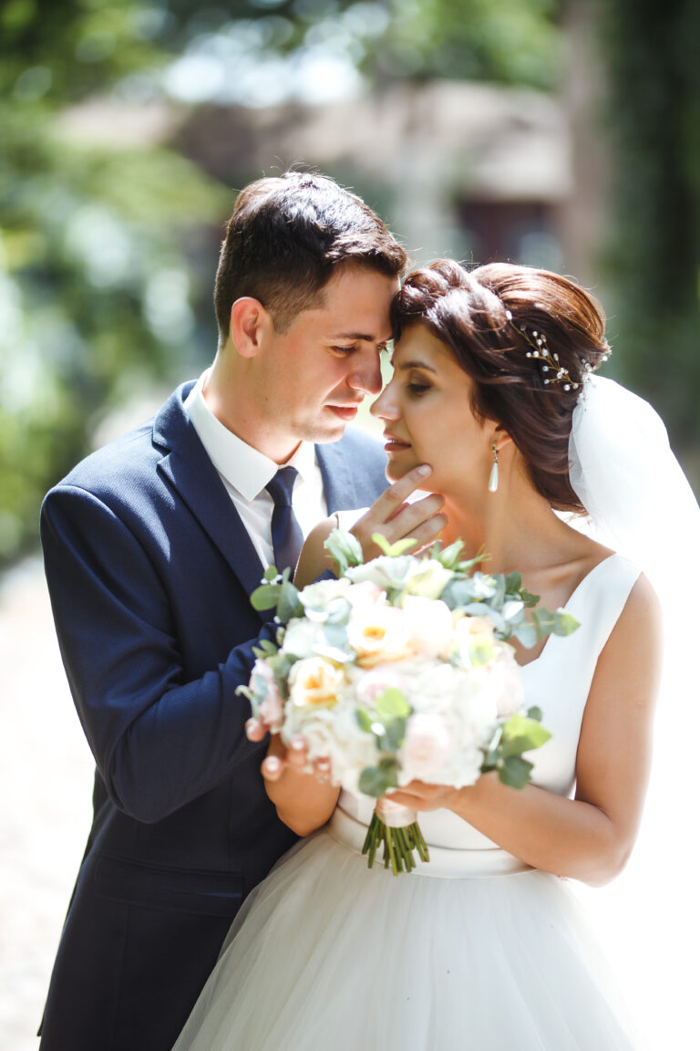 The bride and groom walk together.